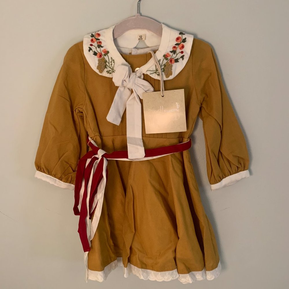 Well Dressed Wolf Holiday Pre-Order Deep Gold. NWT